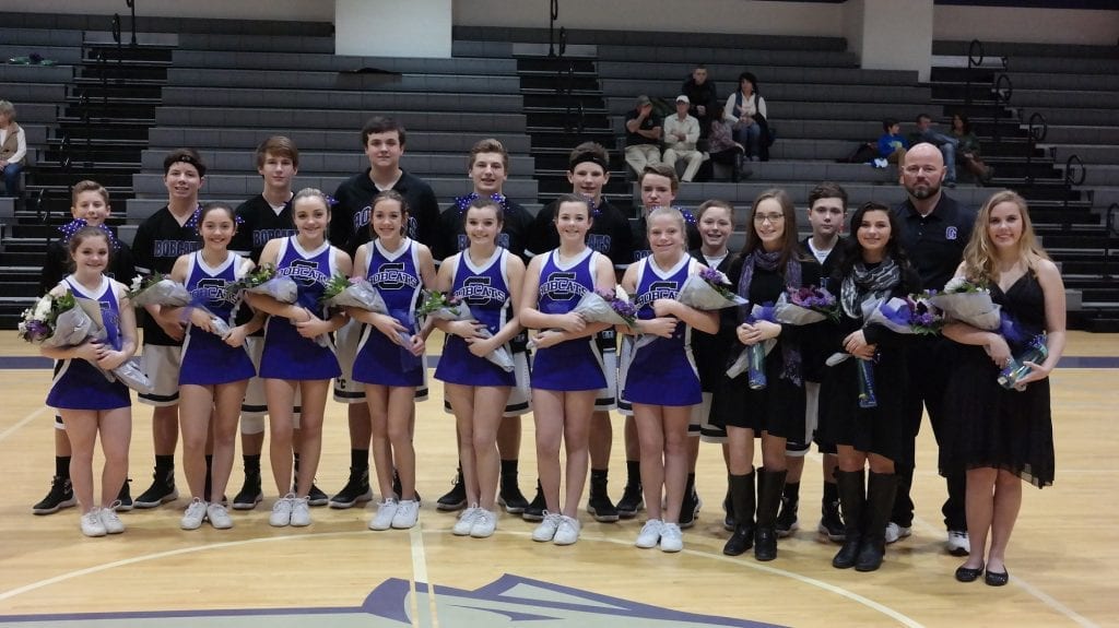 In-between the seventh and eighth-grade games against Fannin Jan. 14, the Clear Creek Middle School Bobcats recognized its cheerleaders, managers and basketball players. Front row (L to R): Cheerleaders Zaide Ball, Emma Henderson, Riana Henderson, Reagan Garner, Lexi Cantrell, Aniston Fowler, Merina Hicks, Managers Erin Johnson, Millie Kerr and Brooklyn Bowen. Back row (L to R): Bobcats basketball players Tyler Wright, Mason Hadden, Alex Snelgrove, Justus Bennett, C.J. Streicher, Connor Thompson, Nathan Jones, Luke Wimpey, Logan Watkins, Coach Michael Crocker. (Photo by: Kevin Hensley)