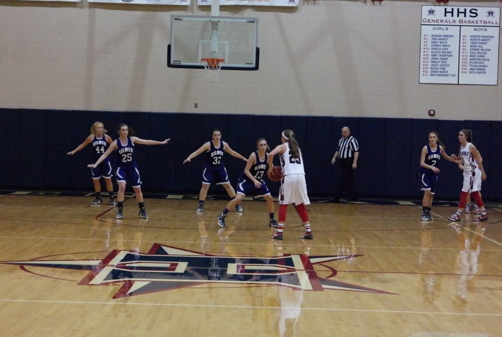 The Lady Cats starting five position themselves on defense last Friday at Heritage. Emily Sanford (25) and Hannah Jones (2) scored 24 and 21 points, respectively, to help propel Gilmer to a 64-49 victory over the Lady Generals. (Photo by: Kevin Hensley)