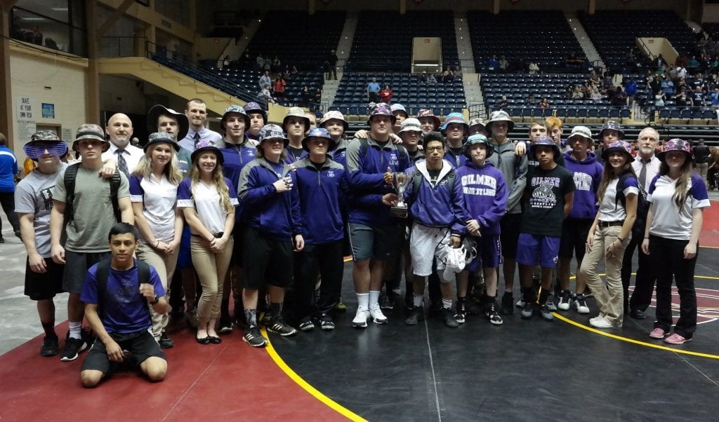 Gilmer Bobcat wrestlers, managers and coaches pose with the 2015-16 GHSA Class 4A State Duals Championship Trophy. They captured the coveted crown last Saturday in Macon. (Photo by: Kevin Hensley)