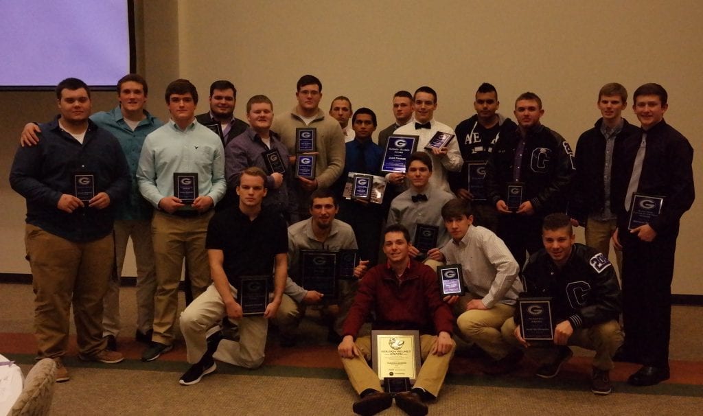 Pictured are the Gilmer High School Bobcats football team award winners. Awards were handed out last night at the season-ending banquet. Seated in middle is Thaddeus Bowers, Captain's and Coca-Cola Golden Helmet (MVP) Awards. Kneeling left to right are: James Dover, Scout Team Defense Award, Lucas Bramlett, All-Region First Team, Captain's  and Huff-Mosley Awards; Griffin Cagle, All-Region Honorable Mention and Best Wide Receiver Awards; Kell Kiker, All-Region Second Team and Best Defensive Back Awards; Austin Daman, Academic Award. Standing left to right are: Shane Bowman, Captain's Award; Noble Zuschlag, All-Region First-Team, Captain's and Best Linebacker Awards; Dustin Brenner, Most Improved Offensive Player Award; Garrett Sellers, Captain's Award; Casey Dyer, Most Improved Defensive Award; Levi Seabolt, All-Region First Team, Captain's and Best Offensive Lineman Awards; Russell Cochran, Captain's and Best Offensive Back Award; Alix Lopez, All-Region Second Team and Best Special Teams Player Awards; Cameron Engler, All-Region Second Team Award;  Jake Parker, All-Region Honorable Mention, Captain's and Gudger-Sluder Awards; Ray Zuniga, Coach's Award; Austin Lacy, All-Region Honorable Mention and Best Defensive Lineman Awards; Tanner Cantlay, Academic Award; Bryson Smith, Scout Team Defense Award. (Photo by: Kevin Hensley)