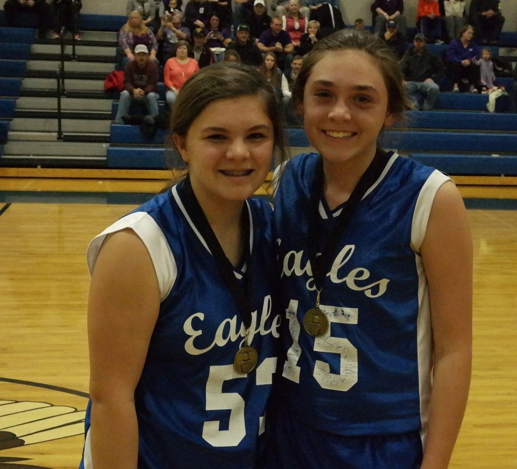 Following the Clear Creek/Riverview contest, the Lady Eagles recognized Kailee Lebel (left) as their Academic Award winner and Shyla Sheffield (right) as their All-Tournament selection. (Photo by: Kevin Hensley)
