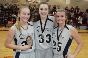 After the Riverview/Dawson game, the Lady Eagles recognized Chloe Bennett (left) as their Tournament MVP, Roxie Fricton (center) as their All-Tournament Selection and Piper Wright (right) as their Academic Award recipient. (Photo by: Kevin Hensley)