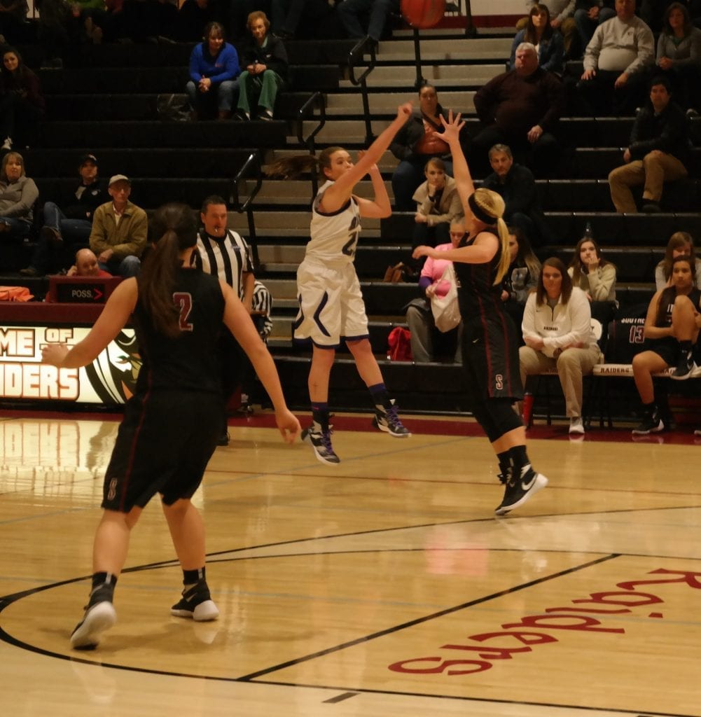 Emily Sanford launches a three against Southeast Whitfield last Saturday. She led Gilmer with 17 points in the Lady Cats 63-53 loss to the Lady Raiders. (Photo by: Kevin Hensley)