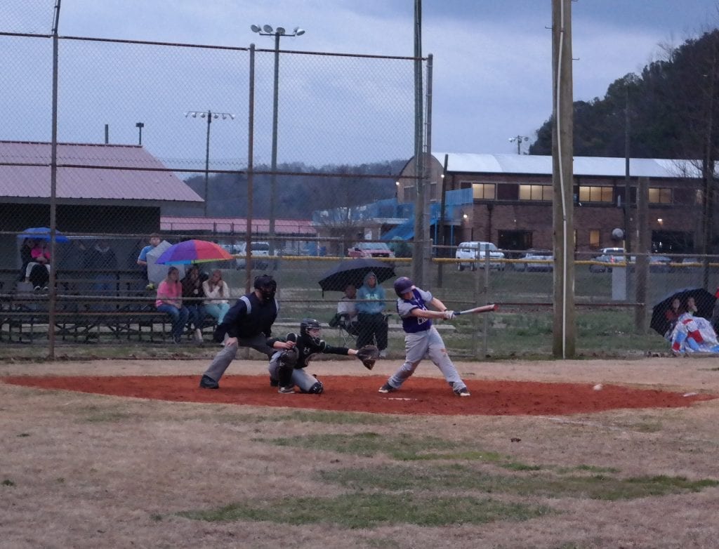 Bobcat Christian Cash hits a comebacker to the pitcher last night against Pickens. Clear Creek fell to 0-3 in its debut season with a 7-0 to the Dragons last night at Woody Field at the Gilmer County Recreation and Parks Department. (Photo by: Kevin Hensley)