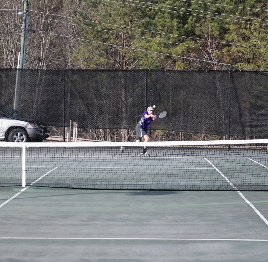Bobcat Riley Hice reaches for a return against Murray County Indian Tucker Hemphill last Monday at GHS. Hice downed Hemphill 8-0, before defeating Ridgeland Panther Austin Long 6-0, 6-0 the next day in region play. (Photo by: Kevin Hensley)